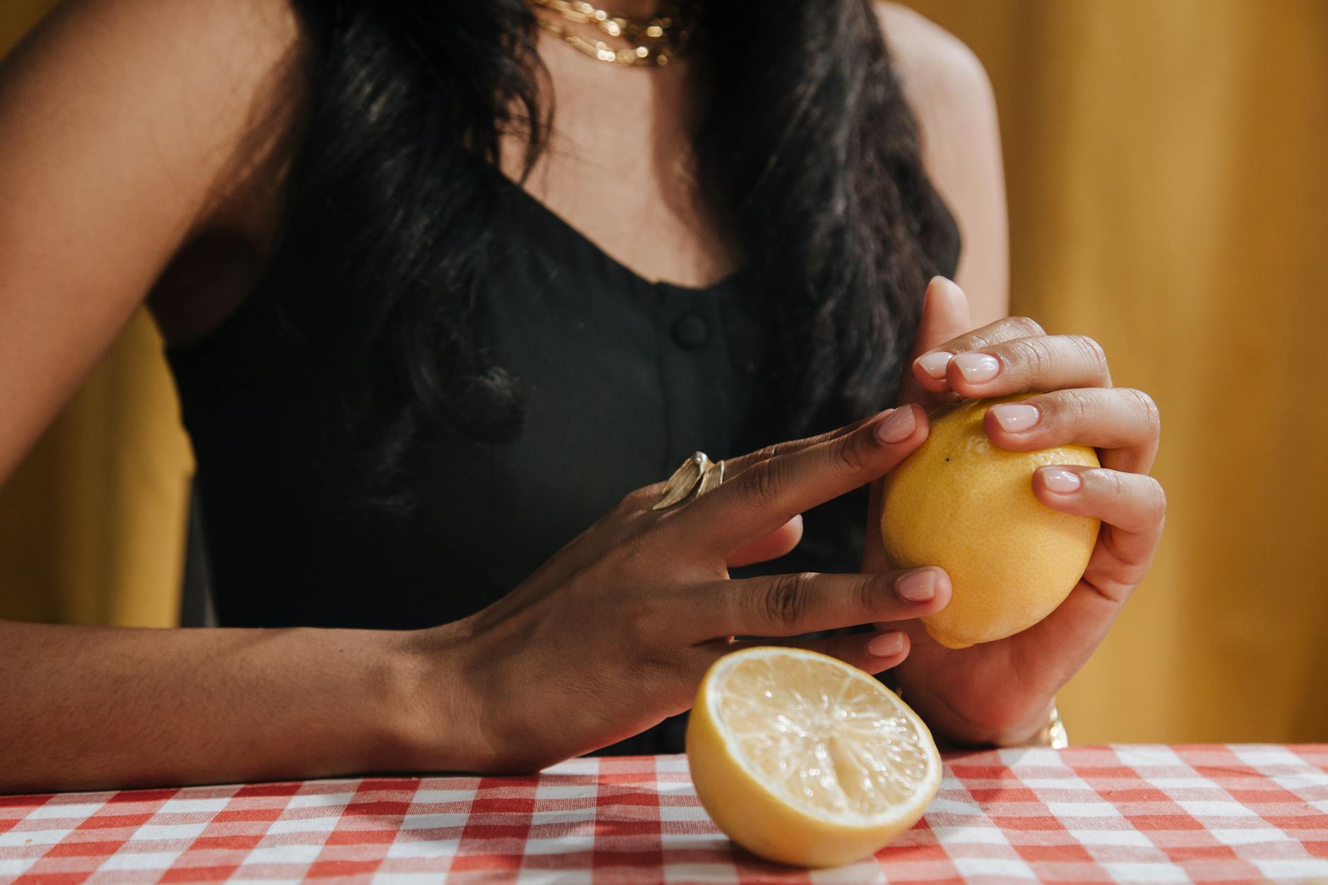 Woman holding vibrators in a contemplative moment of reconnection
