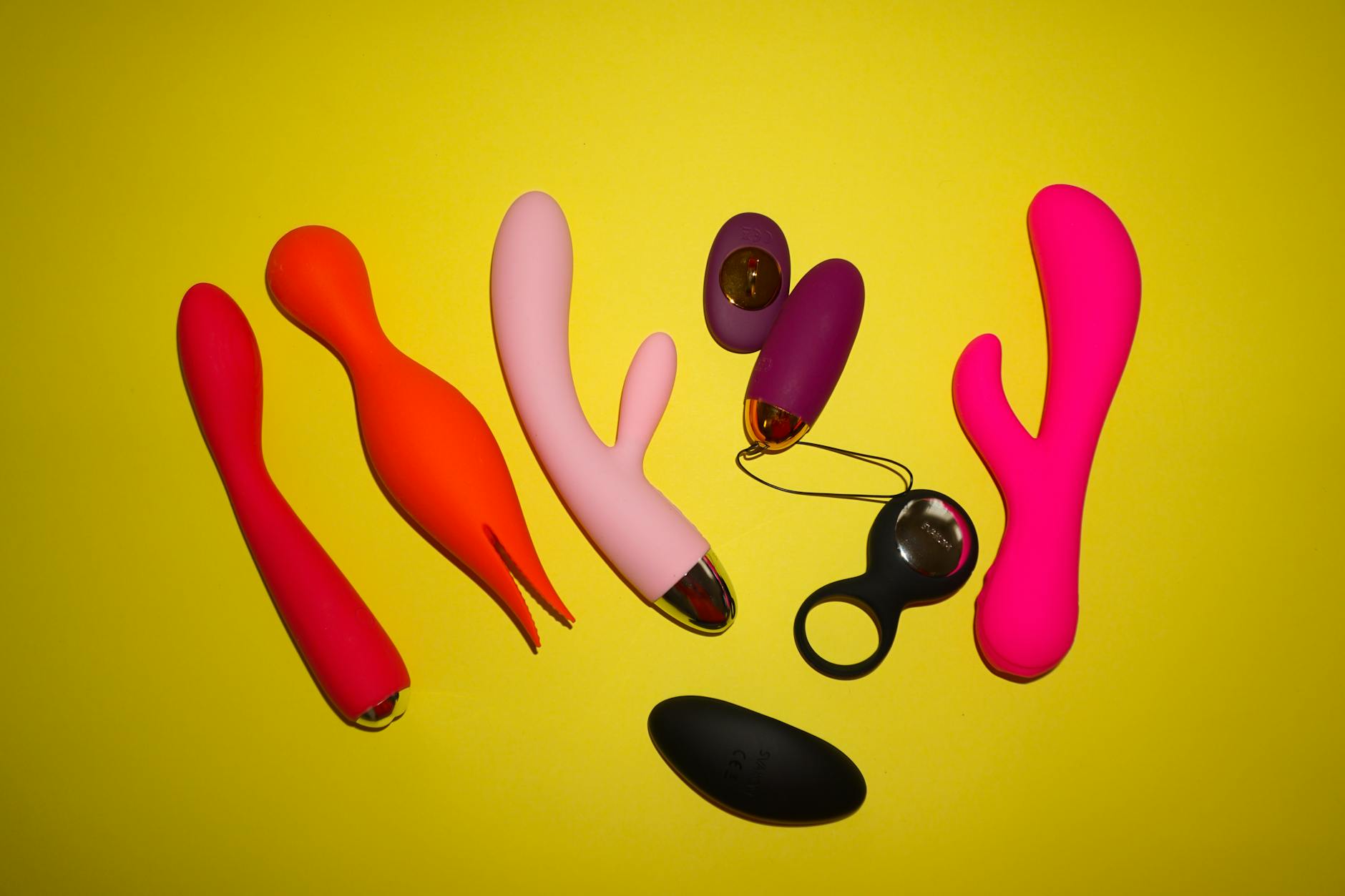 A blue silicone vibrator held in hand, symbolizing pleasure and self-care options